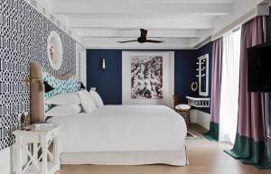 Ліжко або ліжка в номері Capri Tiberio Palace - The Leading Hotels of the World