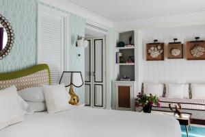 Ліжко або ліжка в номері Capri Tiberio Palace - The Leading Hotels of the World