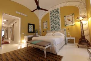 Ліжко або ліжка в номері Capri Tiberio Palace - The Leading Hotels of the World