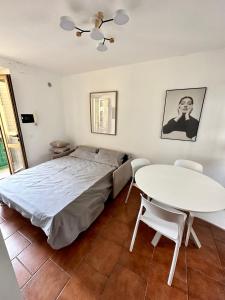 Letto o letti in una camera di Casa Cibrario - vicino Porta Susa F.S.