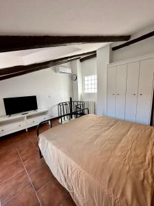 Letto o letti in una camera di Casa Cibrario - vicino Porta Susa F.S.