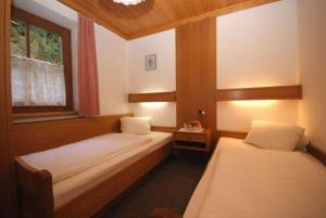Кровать или кровати в номере Appartementhaus Bergblick