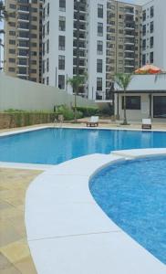 Bassein majutusasutuses Armonia 2 Bdrm Apt/Gym/Poolview/Wi-Fi/Netflix või selle lähedal