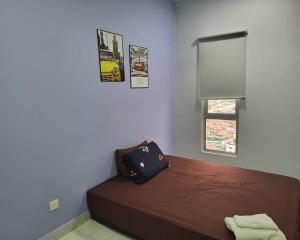 1 dormitorio con 1 cama en una habitación en Bukit jalil Stadium & Axata Arena with Juccuzi, en Kuala Lumpur