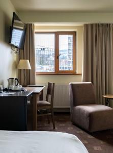Cama ou camas em um quarto em Best Western Vilnius