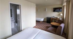 Cama ou camas em um quarto em Best Western Vilnius