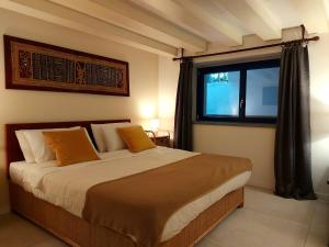 Uma cama ou camas num quarto em Villa with private pool and garden