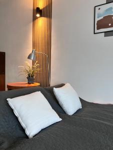 Postel nebo postele na pokoji v ubytování Sunhill Buda Centre