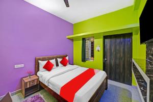 Un pat sau paturi într-o cameră la Hotel O Comfort ZON