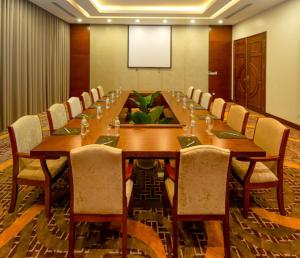 a large conference room with a long table and chairs at Xavia Hotel Quy Nhơn in Quy Nhon