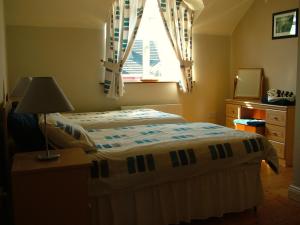 Krevet ili kreveti u jedinici u okviru objekta 29 Waterville Links Holiday Home