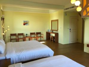 Krevet ili kreveti u jedinici u okviru objekta Tian Nian B&B