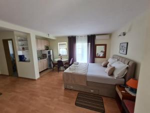 Postel nebo postele na pokoji v ubytování Apartments Bosnjak