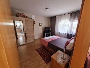 Postel nebo postele na pokoji v ubytování Apartments Bosnjak
