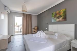 Postel nebo postele na pokoji v ubytování Atrium Hotel + 35 fotografií