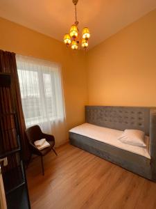 Postel nebo postele na pokoji v ubytování SPA&Hotel MŪSA PARADISE