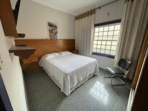 Krevet ili kreveti u jedinici u okviru objekta Casa Mimos de Minas