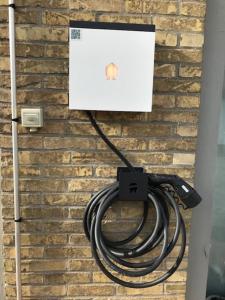 a cord hooked up to a brick wall at oyenkerke in De Panne