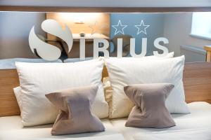 Postel nebo postele na pokoji v ubytování Penzion Sirius