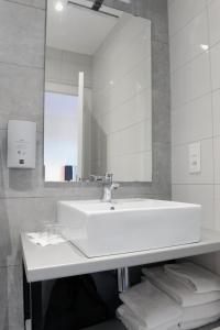 Ein Badezimmer in der Unterkunft Logis Hôtel du Chêne