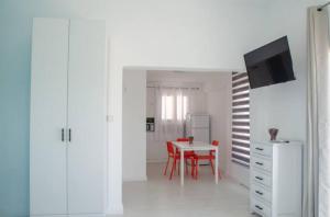 TV a/nebo společenská místnost v ubytování Apartments BU93