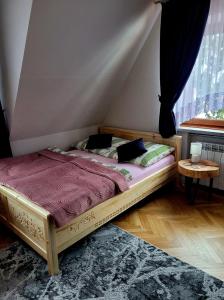 Łóżko lub łóżka w pokoju w obiekcie Noclegi Bobrowski