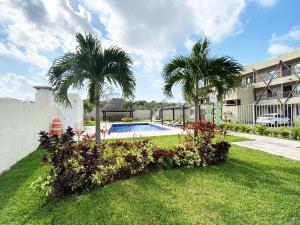 Zahrada ubytování El Wayak - Con Piscina Parking y Parque