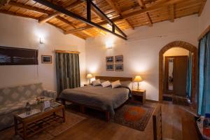 A bed or beds in a room at Avenida Himalayan Retreat