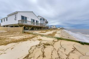 a house on the beach next to the ocean at Cape May Vacation Rental with Panoramic Ocean Views! in Cape May Court House