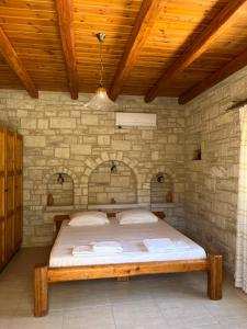 Ένα ή περισσότερα κρεβάτια σε δωμάτιο στο Stavroula House