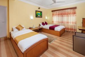 Voodi või voodid majutusasutuse Hotel Yeti toas +21 fotot