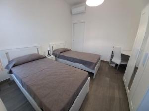 Katil atau katil-katil dalam bilik di Berg House 249 Apartment Self Check in