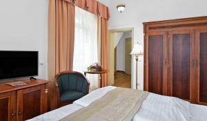 TV a/nebo společenská místnost v ubytování Hotel Continental