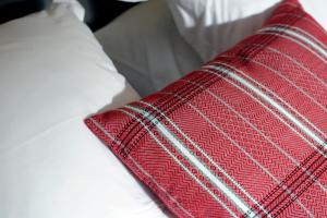 Ein Bett oder Betten in einem Zimmer der Unterkunft Logis Hôtel du Chêne