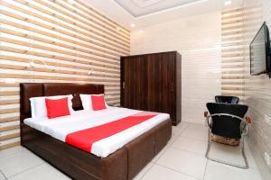 Postel nebo postele na pokoji v ubytování Hotel O Max + 29 fotografií