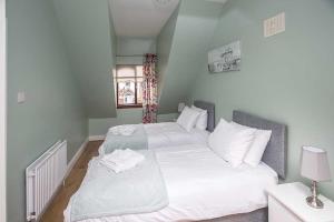 Letto o letti in una camera di Sleepy Rock