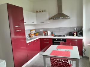 Kuchyň nebo kuchyňský kout v ubytování Chambre privée