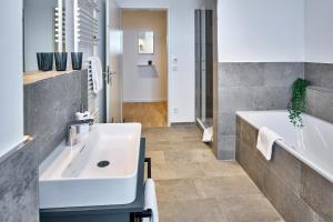 Phòng tắm tại Lüttjeod Apartmentvilla Lüttjeod Apartmentvilla 15 +10 ảnh