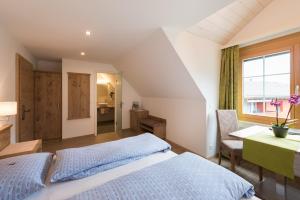 Voodi või voodid majutusasutuse Hotel Restaurant Hirschen toas