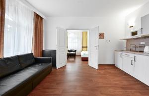 Kuchyňa alebo kuchynka v ubytovaní Apartments Central Park Marienbad