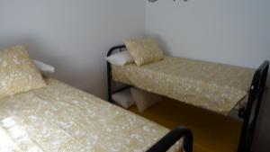 A bed or beds in a room at Villa Montiel Még 16 kép