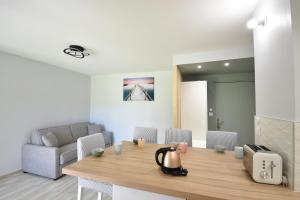 Posezení v ubytování Ermitage - Hossegor centre ville confortable appartement en rez de jardin