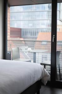 Postel nebo postele na pokoji v ubytování Designflats Gent