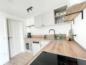 Köök või kööginurk majutusasutuses Amsel Appartements - Gemütliches Appartement 10 Minuten zum Strand +4 fotot