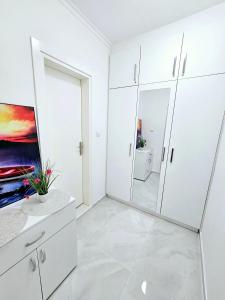 A bathroom at Studio Apartment with balcony 300m from beach