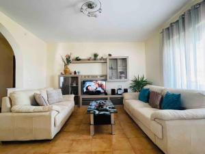 A seating area at Home Sweet Home
