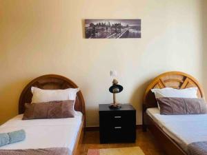 A bed or beds in a room at Home Sweet Home