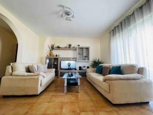 A seating area at Home Sweet Home
