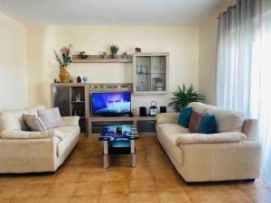 A television and/or entertainment centre at Home Sweet Home
