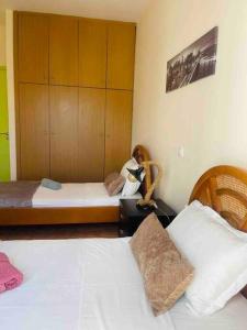 A bed or beds in a room at Home Sweet Home